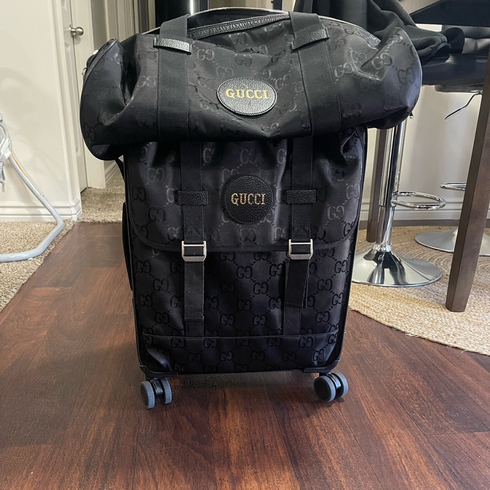 Gucci “Off The Grid” Duffle and Roller Bag Set